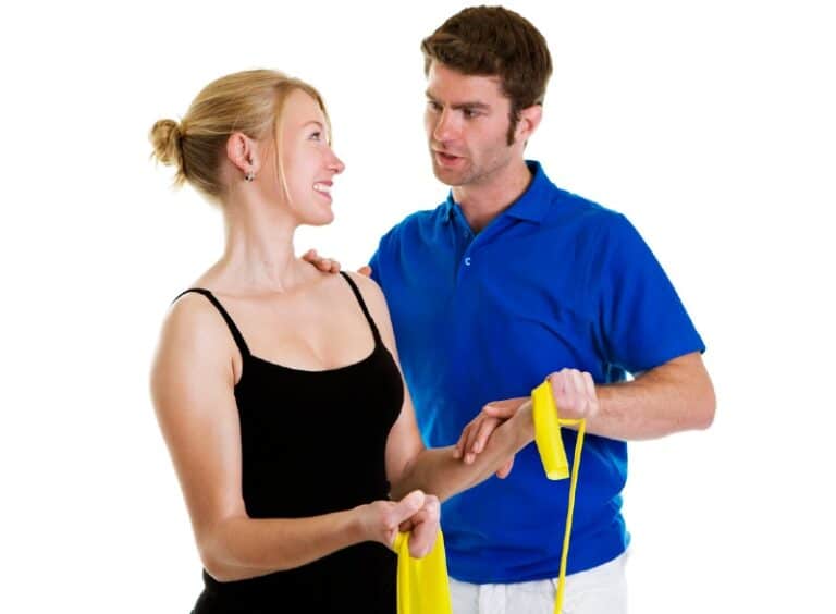 Personal trainer with smiling client